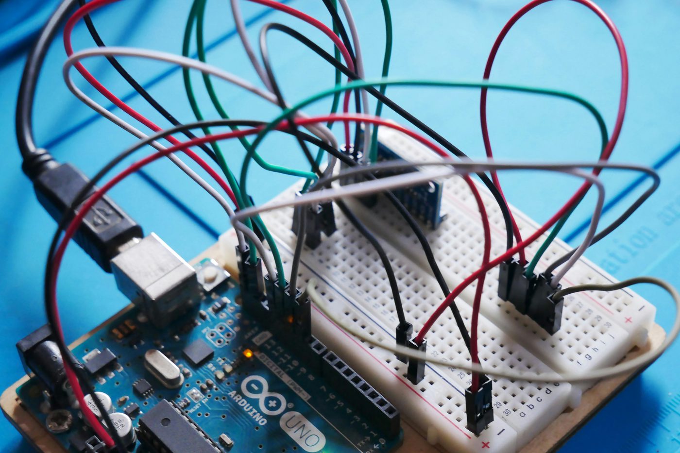 Prototype electronics on a breadboard wired to a microcontroller